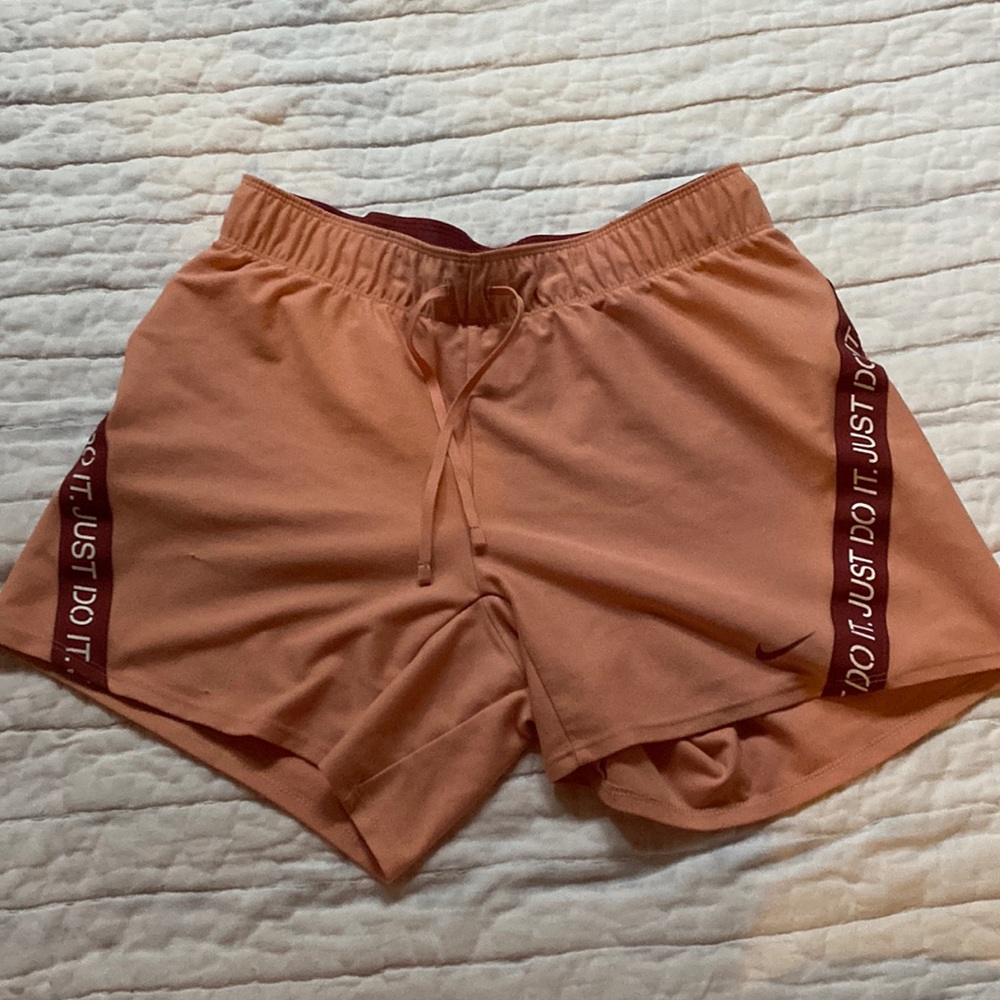 Coral Nike shorts